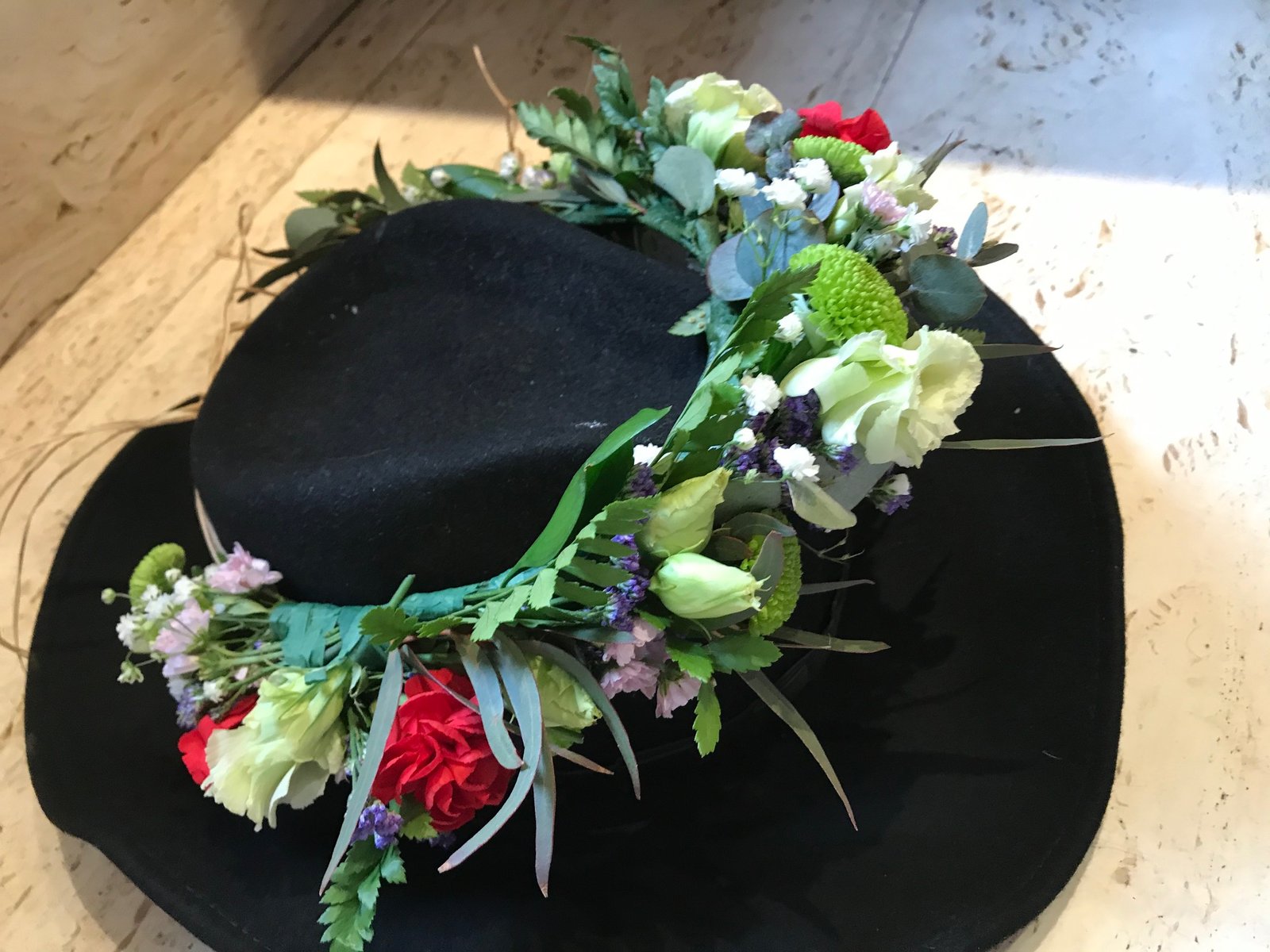 Corona de flores preservadas